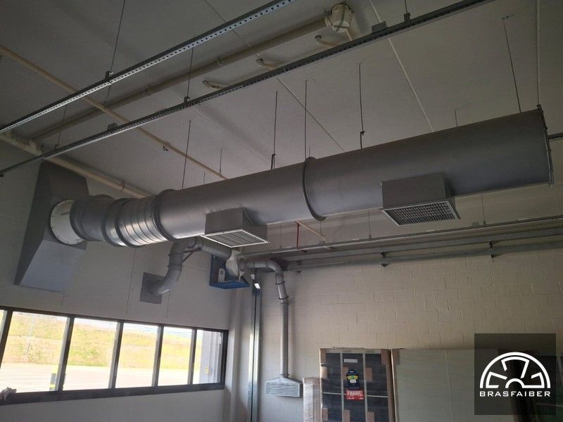 Rede de dutos e exaustor centrífugo industrial instalados em Indústria Alimentícia - Brasfaiber
